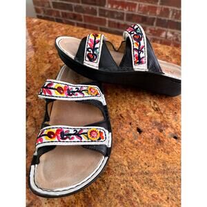 Alegria Clara adjustable strap slide sandals featuring embroidered floral